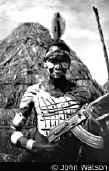 Karo warrior with modern weapon